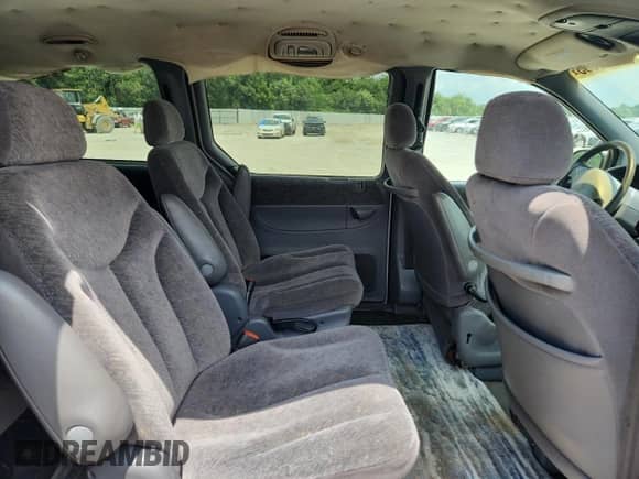2000 Dodge Caravan SE with VIN 2B4GP44G8YR678812, listed as a Copart auction lot 64806385 with 219,554 mi miles and Salvage title. Bid and sale history available at DreamBid. Image 11.