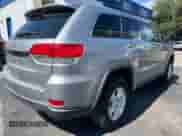 2017 Jeep Grand Cherokee Laredo with VIN 1C4RJFAG5HC771809, listed as a Copart auction lot 71249125 with 169,000 mi miles and Clean title. Bid and sale history available at DreamBid. Image 4.