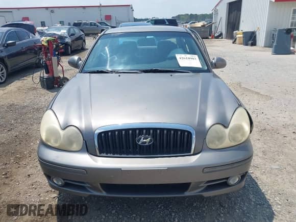 2004 Hyundai Sonata z VIN KMHWF25SX4A033243, wystawiony jako IAAI lot #42610903 z przebiegiem 162 967 mil mil oraz . Historia ofert i sprzedaży dostępna na DreamBid. Obrazek 12.