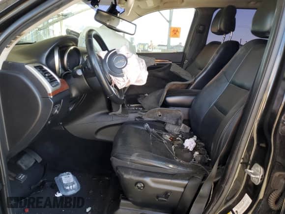 2013 Jeep Grand Cherokee Limited с VIN 1C4RJEBG2DC656944, выставлен на аукционе Copart как лот 82191405 с пробегом Не указан миль и Списание • Salvage title. История ставок и продаж доступна на DreamBid. Изображение 7.