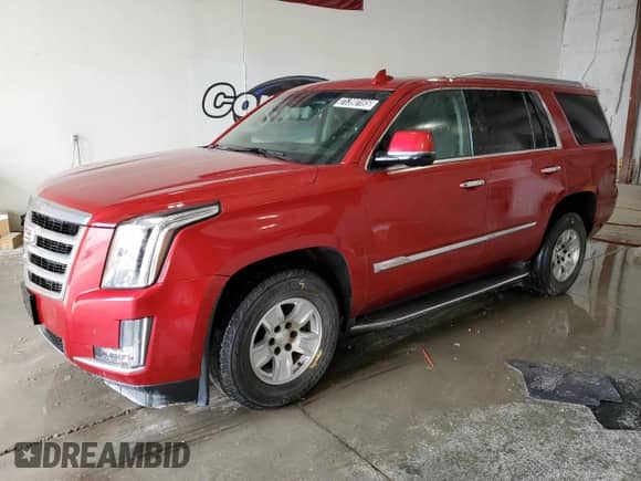 2015 Cadillac Escalade Luxury with VIN 1GYS4MKJ4FR597968, listed as a Copart auction lot 71390165 with 171,396 mi miles and Clean title. Bid and sale history available at DreamBid. Image 1.