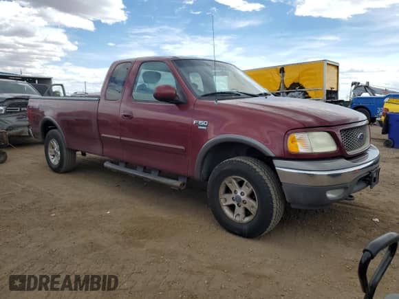 2003 Ford F-150 XL with VIN 1FTRX18L93NB06929, listed as a Copart auction lot 80067245 with 122,302 mi miles and Clean title. Bid and sale history available at DreamBid. Image 4.