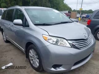 2017 Toyota Sienna LE with VIN 5TDJZ3DC8HS184113, listed as a IAAI auction lot 43153189 with 100,814 mi miles and . Bid and sale history available at DreamBid. Image 1.