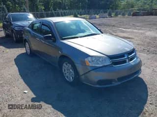 2013 Dodge Avenger SE V6 with VIN 1C3CDZAG7DN749313, listed as a IAAI auction lot 42761341 with 128,548 mi miles and . Bid and sale history available at DreamBid. Image 1.