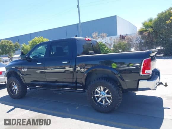 2018 Ram 1500 Laramie with VIN 1C6RR7NM5JS338590, listed as a IAAI auction lot 42922478 with 91,939 mi miles and . Bid and sale history available at DreamBid. Image 14.