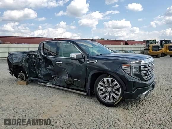 2023 GMC Sierra 1500 Denali с VIN 3GTUUGE85PG143996, выставлен на аукционе Copart как лот 70958025 с пробегом 57 331 миль миль и Списание • Salvage title. История ставок и продаж доступна на DreamBid. Изображение 14.