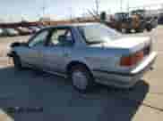 1990 Honda Accord LX with VIN JHMCB7652LC076386, listed as a Copart auction lot 57727165 with 245,375 mi miles and Salvage title. Bid and sale history available at DreamBid. Image 2.