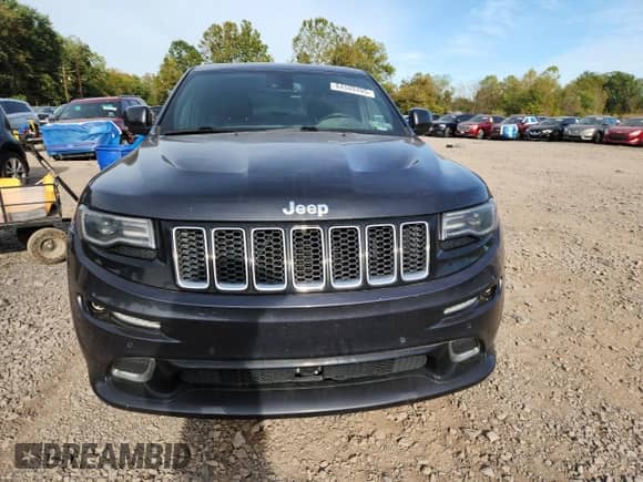 2014 Jeep Grand Cherokee SRT-8 z VIN 1C4RJFDJ2EC198810, wystawiony jako Copart lot #84599495 z przebiegiem 135 251 mil mil oraz Czysty tytuł • Clean title. Historia ofert i sprzedaży dostępna na DreamBid. Obrazek 5.