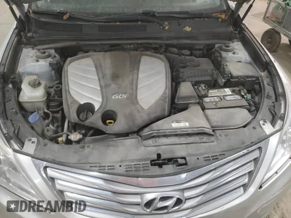 2012 Hyundai Azera с VIN KMHFG4JG2CA183114, выставлен на аукционе Copart как лот 82852674 с пробегом 169 546 миль миль и Списание • Salvage title. История ставок и продаж доступна на DreamBid. Изображение 11.