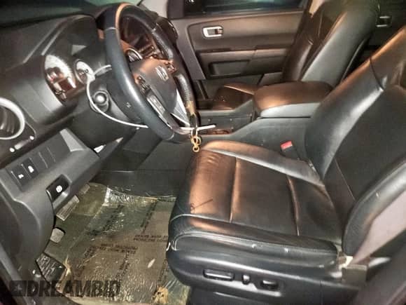 2014 Honda Pilot Touring z VIN 5FNYF3H9XEB007701, wystawiony jako Copart lot #90083335 z przebiegiem 133 779 mil mil oraz Czysty tytuł • Clean title. Historia ofert i sprzedaży dostępna na DreamBid. Obrazek 7.