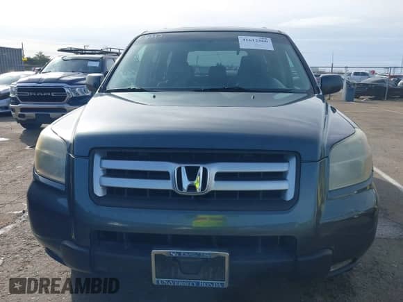 2006 Honda Pilot EX-L with VIN 5FNYF28796B026606, listed as a IAAI auction lot 41612560 with 224,577 mi miles and . Bid and sale history available at DreamBid. Image 6.