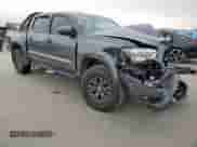2022 Toyota Tacoma SR5 with VIN 3TMAZ5CN7NM178216, listed as a Copart auction lot 70889745 with 51,289 mi miles and Salvage title. Bid and sale history available at DreamBid. Image 4.
