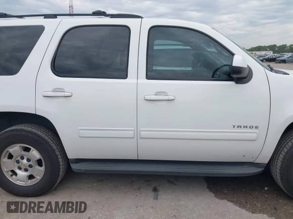 2012 Chevrolet Tahoe LS z VIN 1GNSCAE00CR317167, wystawiony jako IAAI lot #42476151 z przebiegiem 247 595 mil mil oraz . Historia ofert i sprzedaży dostępna na DreamBid. Obrazek 13.