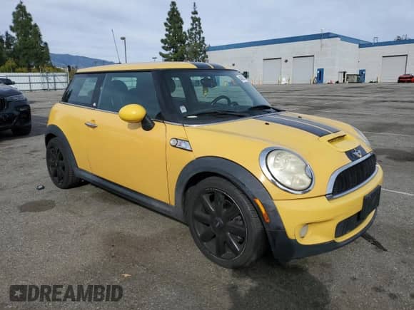 2009 MINI Hardtop S with VIN WMWMF73599TW87679, listed as a Copart auction lot 46863725 with 102,976 mi miles and Salvage title. Bid and sale history available at DreamBid. Image 4.