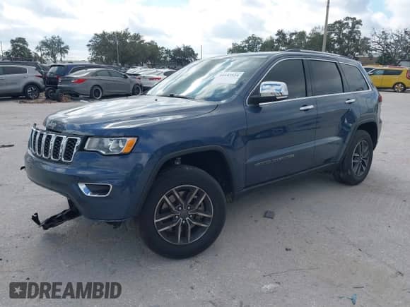 2021 Jeep Grand Cherokee Limited with VIN 1C4RJEBG8MC511987, listed as a IAAI auction lot 41143524 with 63,410 mi miles and . Bid and sale history available at DreamBid. Image 2.