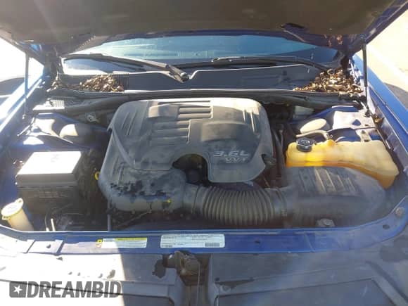 2012 Dodge Challenger SXT z VIN 2C3CDYAG2CH239064, wystawiony jako IAAI lot #43456376 z przebiegiem 228 724 mil mil oraz . Historia ofert i sprzedaży dostępna na DreamBid. Obrazek 10.