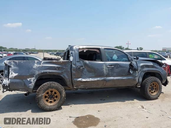 2021 Toyota Tacoma SR5 with VIN 5TFAZ5CN1MX118036, listed as a IAAI auction lot 42840652 with 73,082 mi miles and . Bid and sale history available at DreamBid. Image 13.