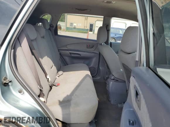 2005 Hyundai Tucson GL z VIN KM8JM12B75U180957, wystawiony jako Copart lot #62412015 z przebiegiem 222 710 mil mil oraz Szkoda całkowita • Salvage title. Historia ofert i sprzedaży dostępna na DreamBid. Obrazek 10.