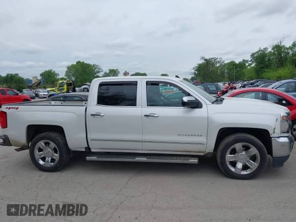 2017 Chevrolet Silverado 1500 LTZ with VIN 3GCUKSEC7HG321180, listed as a IAAI auction lot 42161710 with 148,959 mi miles and . Bid and sale history available at DreamBid. Image 13.