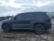 2021 Jeep Grand Cherokee SRT with VIN 1C4RJFDJ7MC559608, listed as a IAAI auction lot 41379028 with 18,464 mi miles and . Bid and sale history available at DreamBid. Image 14.