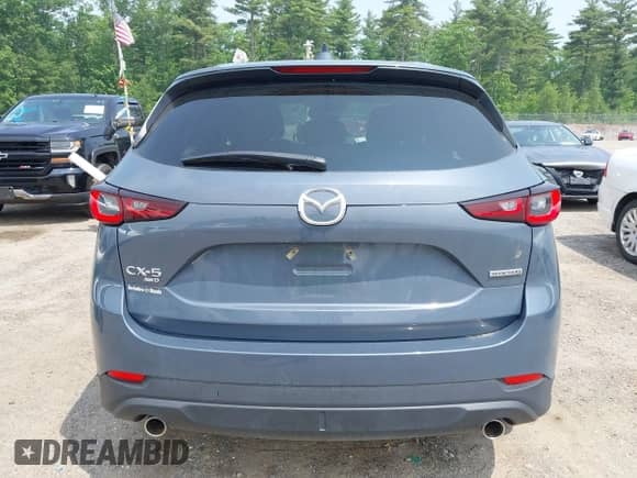 2023 Mazda CX-5 S Carbon Edition z VIN JM3KFBCM5P0179462, wystawiony jako IAAI lot #42451109 z przebiegiem 14 170 mil mil oraz . Historia ofert i sprzedaży dostępna na DreamBid. Obrazek 16.