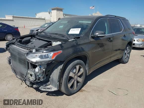 2019 Chevrolet Traverse LT z VIN 1GNERHKW0KJ115178, wystawiony jako IAAI lot #43457510 z przebiegiem 127 984 mil mil oraz . Historia ofert i sprzedaży dostępna na DreamBid. Obrazek 2.