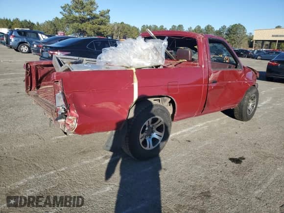 1990 Nissan Frontier z VIN 1N6SD11S6LC409798, wystawiony jako Copart lot #87842705 z przebiegiem Nie podano mil oraz Szkoda całkowita • Salvage title. Historia ofert i sprzedaży dostępna na DreamBid. Obrazek 3.