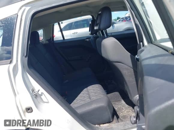 2008 Dodge Caliber SE with VIN 1B3HB28B58D693197, listed as a IAAI auction lot 42754484 with 92,124 mi miles and . Bid and sale history available at DreamBid. Image 8.