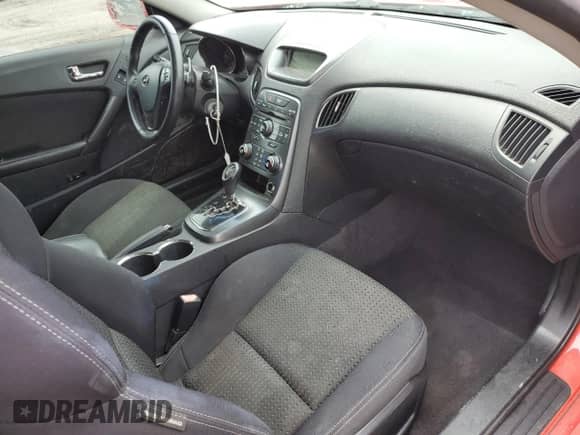 2012 Hyundai Genesis Coupe R-Spec z VIN KMHHT6KD8CU072635, wystawiony jako Copart lot #67398425 z przebiegiem 158 913 mil mil oraz Szkoda całkowita • Salvage title. Historia ofert i sprzedaży dostępna na DreamBid. Obrazek 8.