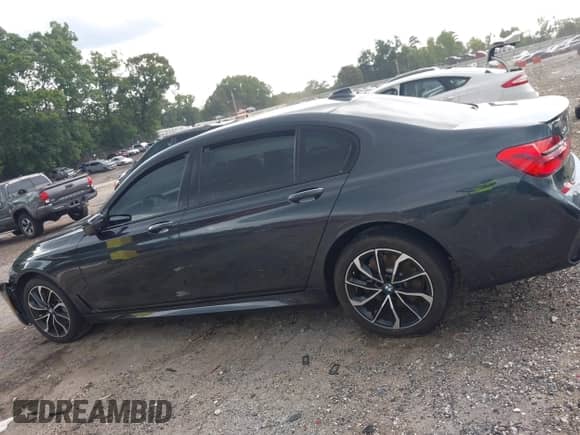 2017 BMW 7 Series ALPINA B7 xDrive with VIN WBA7F2C3XHG423053, listed as a IAAI auction lot 42645980 with 59,200 mi miles and . Bid and sale history available at DreamBid. Image 14.