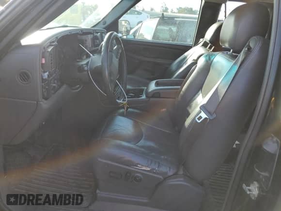 2005 GMC Sierra 1500 SLT with VIN 1GTEC19T35Z138635, listed as a Copart auction lot 87394204 with 115,591 mi miles and Salvage title. Bid and sale history available at DreamBid. Image 7.
