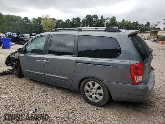 2007 Hyundai Entourage GLS with VIN KNDMC233376023404, listed as a Copart auction lot 69413625 with 135,989 mi miles and Salvage title. Bid and sale history available at DreamBid. Image 2.