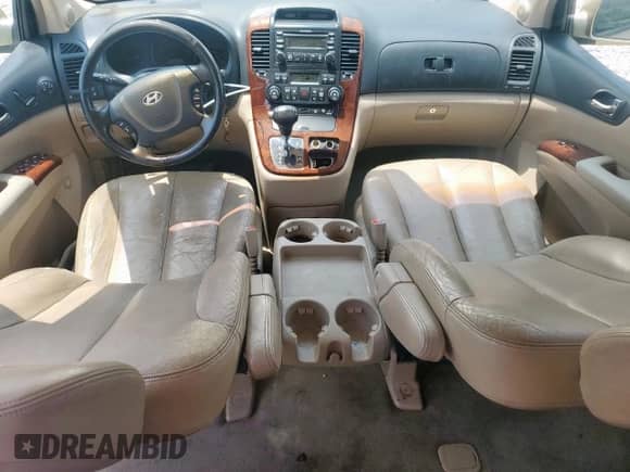 2007 Hyundai Entourage GLS with VIN KNDMC233376033298, listed as a Copart auction lot 68166895 with 154,725 mi miles and Salvage title. Bid and sale history available at DreamBid. Image 8.