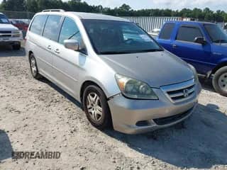 2007 Honda Odyssey EX z VIN 5FNRL38487B140588, wystawiony jako IAAI lot #43163112 z przebiegiem 206 073 mil mil oraz . Historia ofert i sprzedaży dostępna na DreamBid. Obrazek 1.