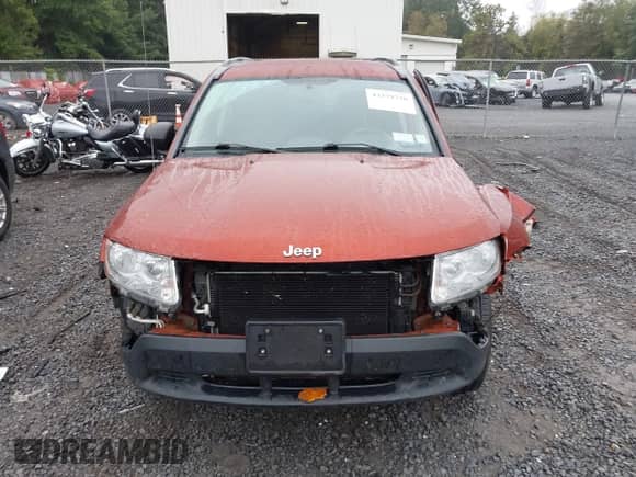 2012 Jeep Compass Sport z VIN 1C4NJDBB9CD675271, wystawiony jako IAAI lot #43279710 z przebiegiem 147 817 mil mil oraz . Historia ofert i sprzedaży dostępna na DreamBid. Obrazek 12.