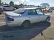 1995 Toyota Camry LE z VIN 4T1GK12E9SU086634, wystawiony jako Copart lot #86205595 z przebiegiem 262 999 mil mil oraz Czysty tytuł • Clean title. Historia ofert i sprzedaży dostępna na DreamBid. Obrazek 3.