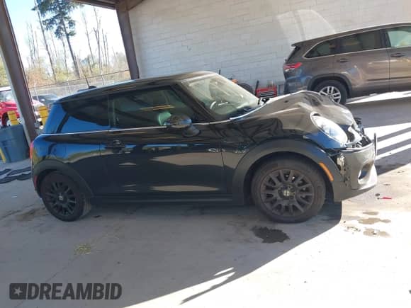 2019 MINI Hardtop Cooper with VIN WMWXP5C50K2H95671, listed as a IAAI auction lot 43432989 with 119,335 mi miles and . Bid and sale history available at DreamBid. Image 13.