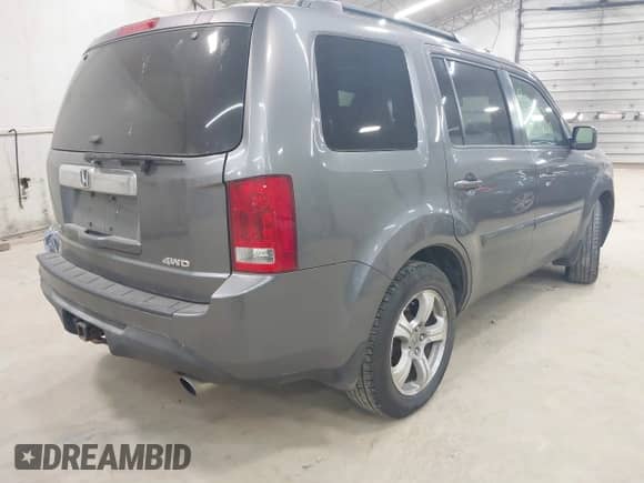 2014 Honda Pilot EX-L z VIN 5FNYF4H52EB024950, wystawiony jako IAAI lot #42874943 z przebiegiem 164 315 mil mil oraz . Historia ofert i sprzedaży dostępna na DreamBid. Obrazek 4.