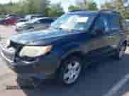 2009 Subaru Forester X with VIN JF2SH63689H734681, listed as a IAAI auction lot 43310176 with 296,187 mi miles and . Bid and sale history available at DreamBid. Image 17.