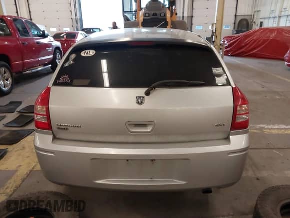 2005 Dodge Magnum SXT with VIN 2D4GZ48VX5H688672, listed as a IAAI auction lot 41466285 with 183,124 mi miles and . Bid and sale history available at DreamBid. Image 16.