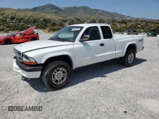 2004 Dodge Dakota Sport with VIN 1D7HG32N04S644610, listed as a Copart auction lot 59817585 with 209,360 mi miles and Salvage title. Bid and sale history available at DreamBid. Image 1.