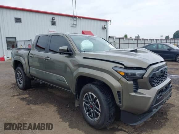 2024 Toyota Tacoma TRD Off Road with VIN 3TMLB5JN0RM045707, listed as a IAAI auction lot 43084854 with Not provided miles and . Bid and sale history available at DreamBid. Image 1.