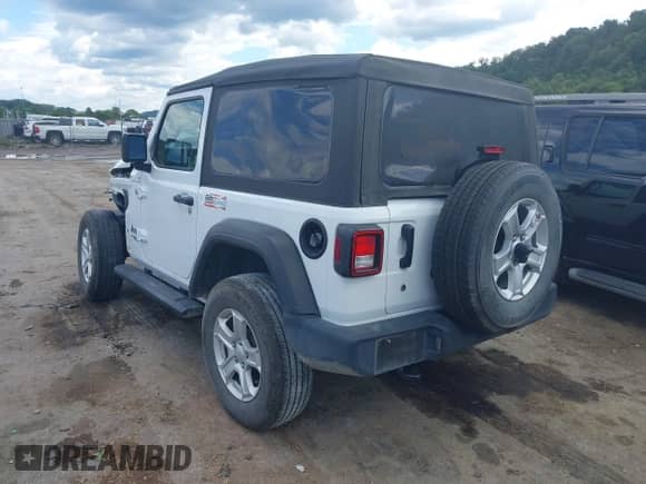 2020 Jeep Wrangler Sport S with VIN 1C4GJXAN3LW121976, listed as a IAAI auction lot 43074171 with 19,927 mi miles and . Bid and sale history available at DreamBid. Image 3.