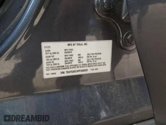 2023 Tesla Model Y Long Range with VIN 7SAYGAEE4PF668889, listed as a Copart auction lot 67239314 with 26,874 mi miles and Salvage title. Bid and sale history available at DreamBid. Image 14.