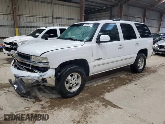 2003 Chevrolet Tahoe LS z VIN 1GNEC13Z33R281053, wystawiony jako Copart lot #69859815 z przebiegiem 167 551 mil mil oraz Szkoda całkowita • Salvage title. Historia ofert i sprzedaży dostępna na DreamBid. Obrazek 1.