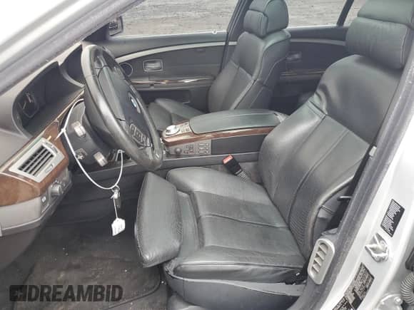 2004 BMW 7 Series 745i with VIN WBAGL634X4DP70421, listed as a Copart auction lot 73309744 with 123,457 mi miles and Salvage title. Bid and sale history available at DreamBid. Image 7.