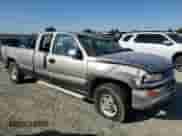 2000 Chevrolet Silverado 2500 LS with VIN 1GCGK29U0YE401167, listed as a Copart auction lot 70407574 with 146,174 mi miles and Salvage title. Bid and sale history available at DreamBid. Image 4.