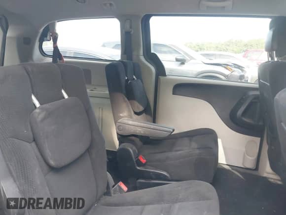 2016 Dodge Grand Caravan SXT with VIN 2C4RDGCG3GR234484, listed as a IAAI auction lot 42710649 with 312,768 mi miles and . Bid and sale history available at DreamBid. Image 8.