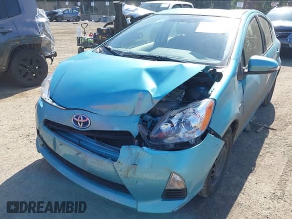 2014 Toyota Prius One z VIN JTDKDTB38E1077268, wystawiony jako IAAI lot #42371177 z przebiegiem 76 842 mil mil oraz . Historia ofert i sprzedaży dostępna na DreamBid. Obrazek 6.