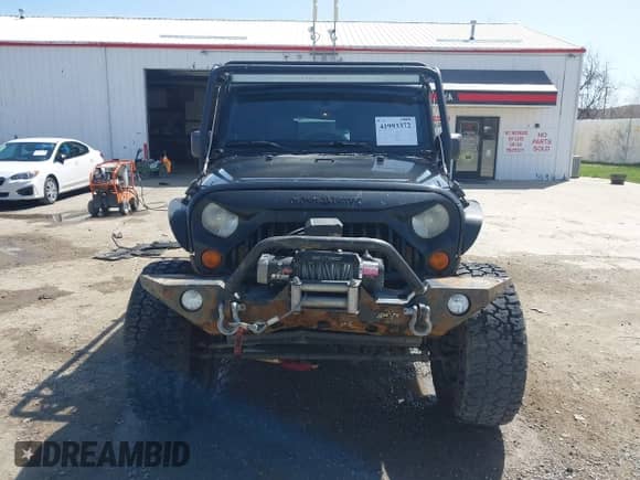 2008 Jeep Wrangler Unlimited X z VIN 1J4GA39188L518712, wystawiony jako IAAI lot #41993372 z przebiegiem 128 278 mil mil oraz . Historia ofert i sprzedaży dostępna na DreamBid. Obrazek 12.